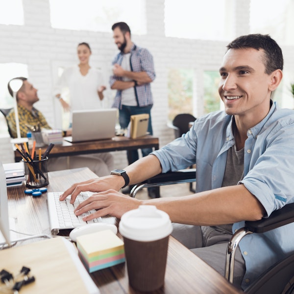 Man in wheelchair working