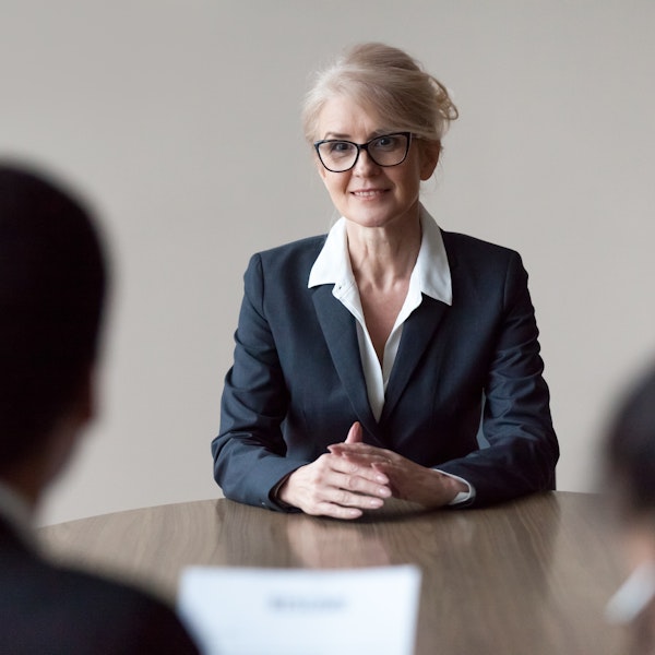Senior woman being interviewed