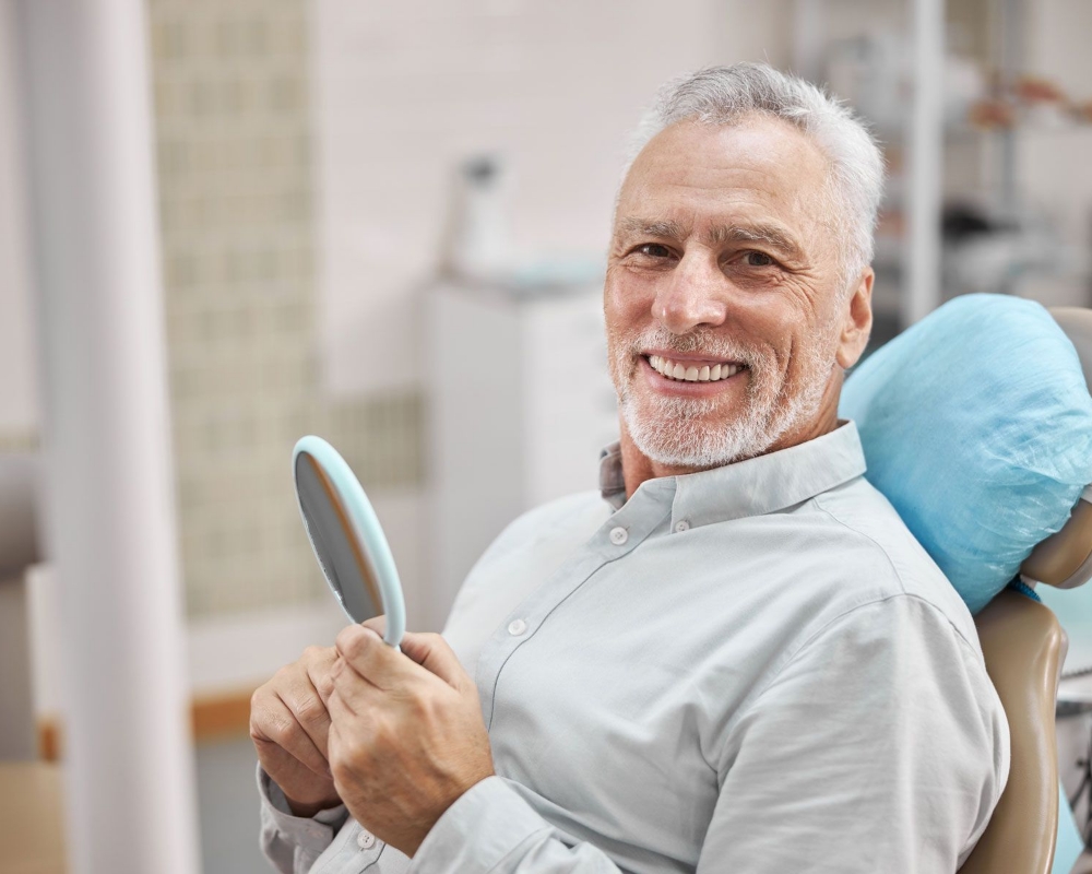 Smiling denture patient