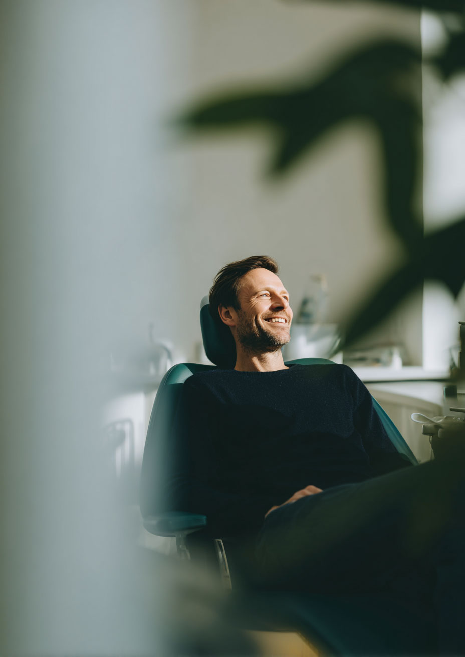 Happy man at the dentist