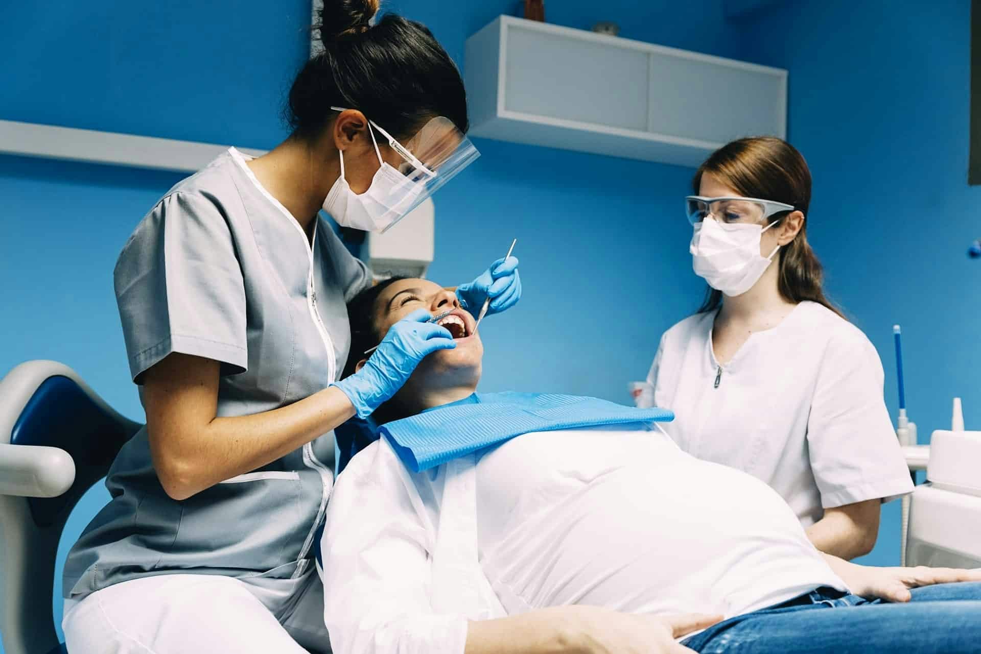dental team working with a patient