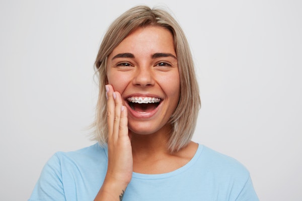 Woman smiling with braces