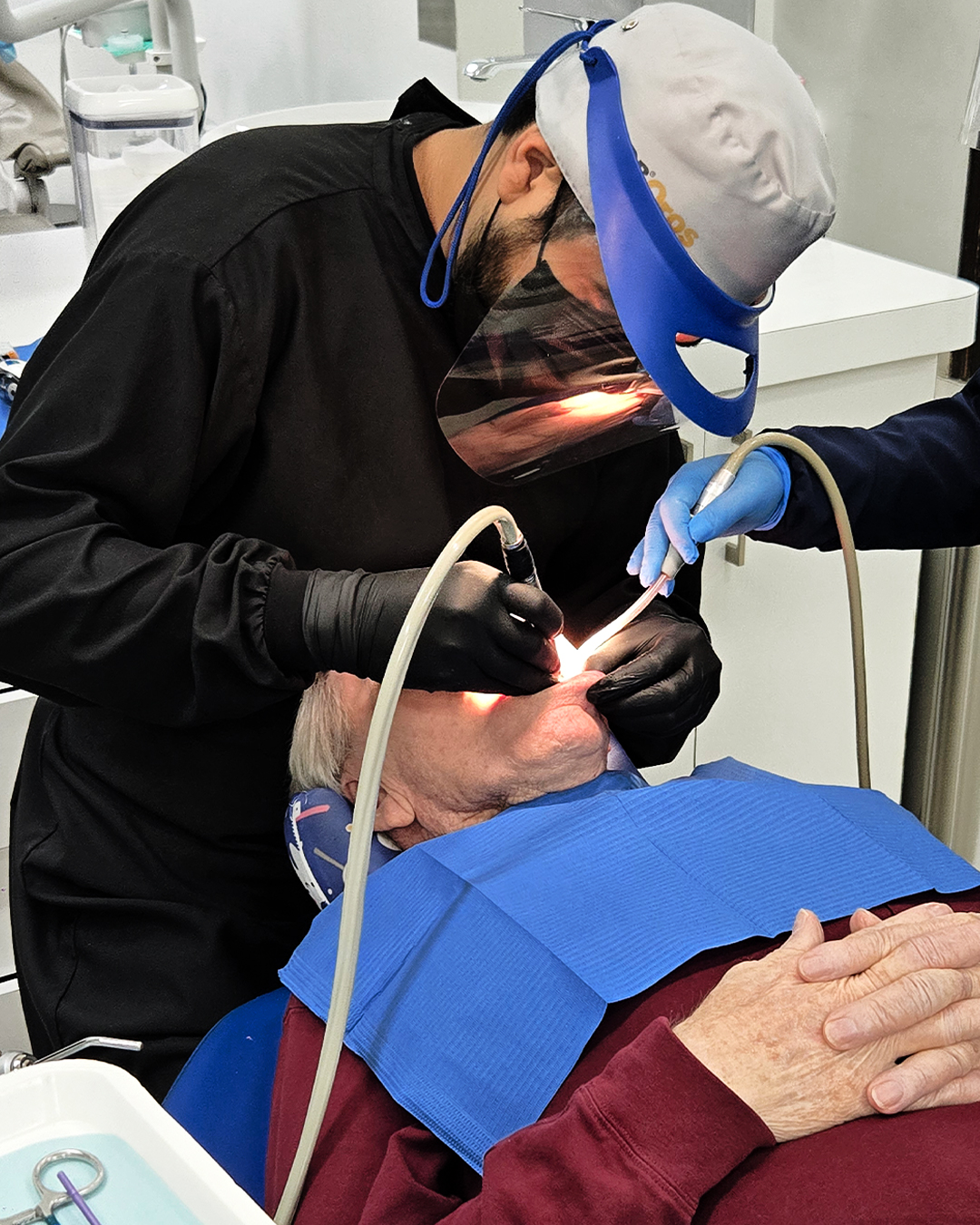 Dental staff with real patient