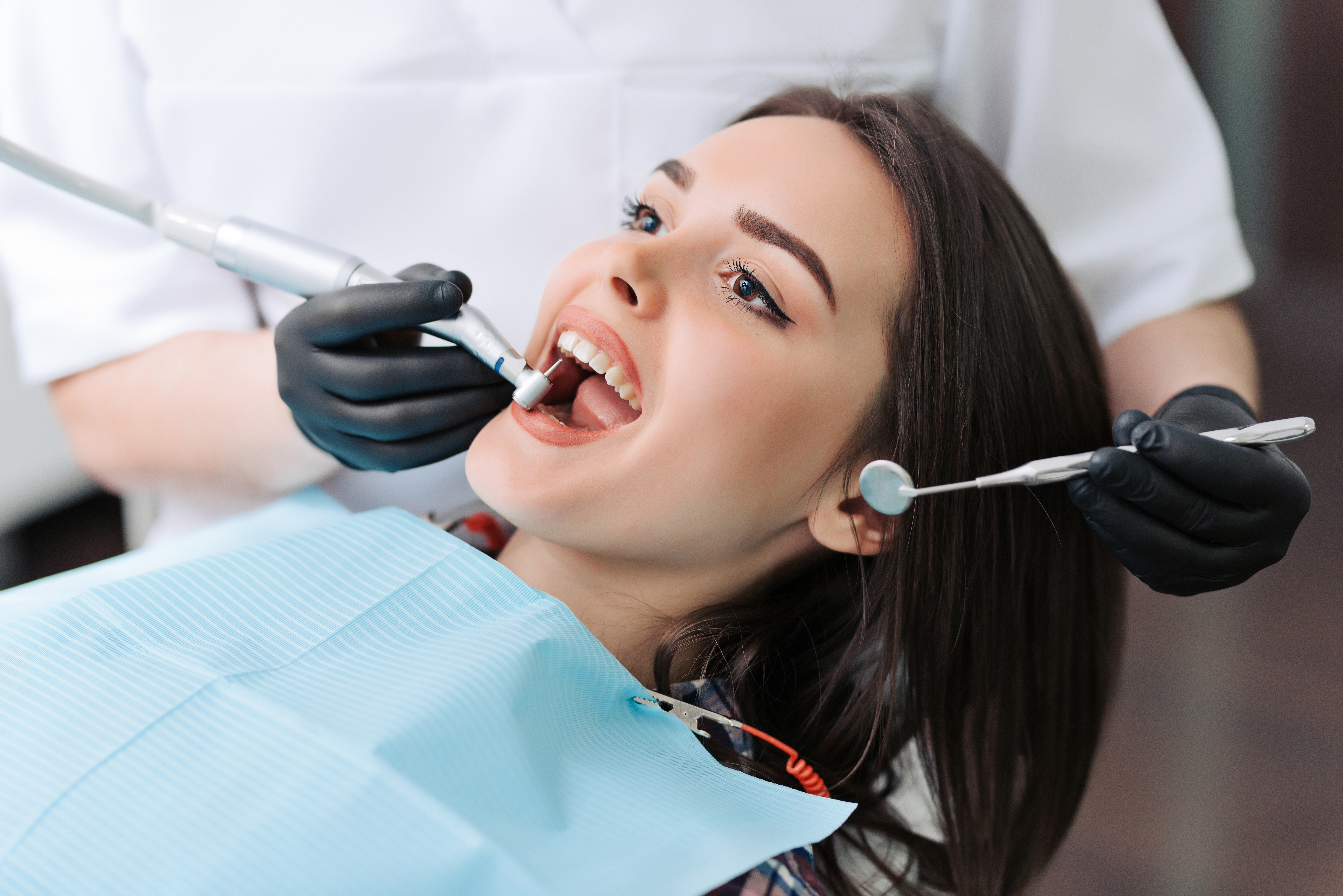 Woman getting her teeth cleaned