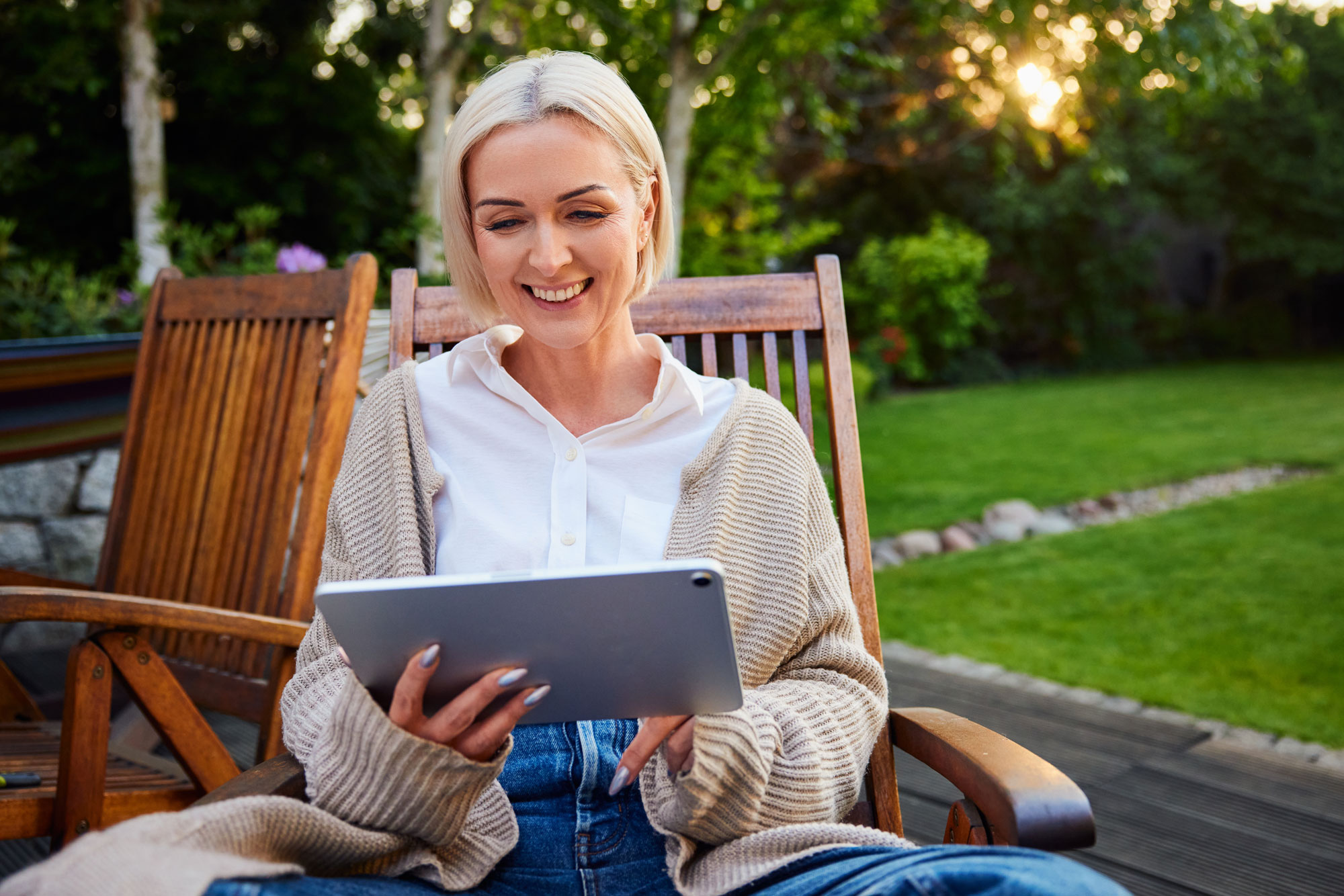 Happy woman saving money on her oral surgery
