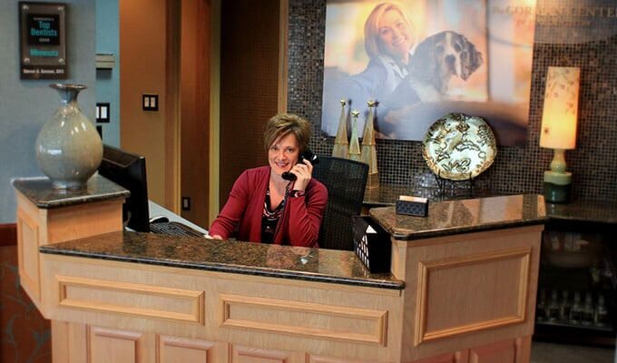 Receptionist at front desk