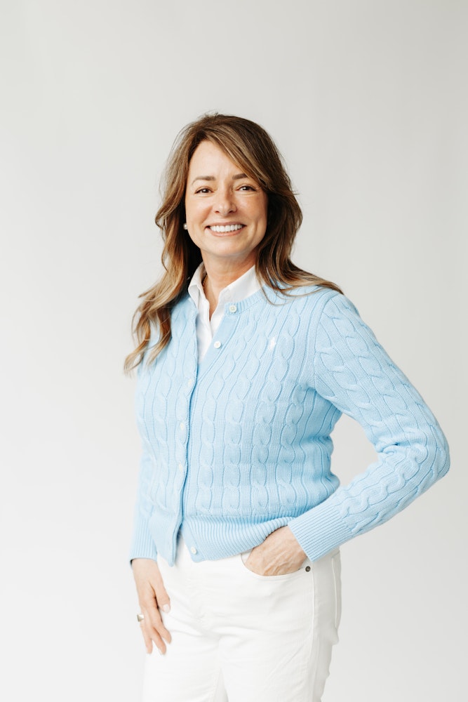 woman in blue sweater