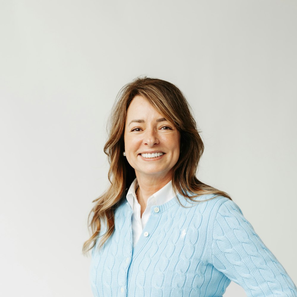 woman in blue sweater