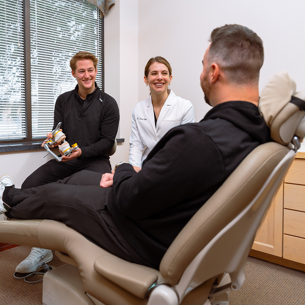Dr. Lippe talking with patient