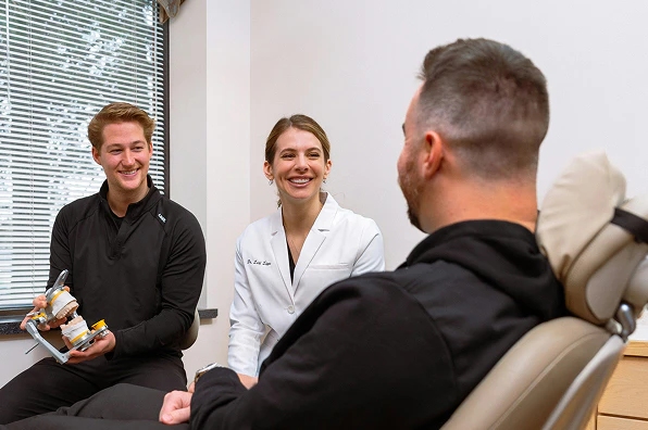 Dr. Lippe and hygeniest with patient