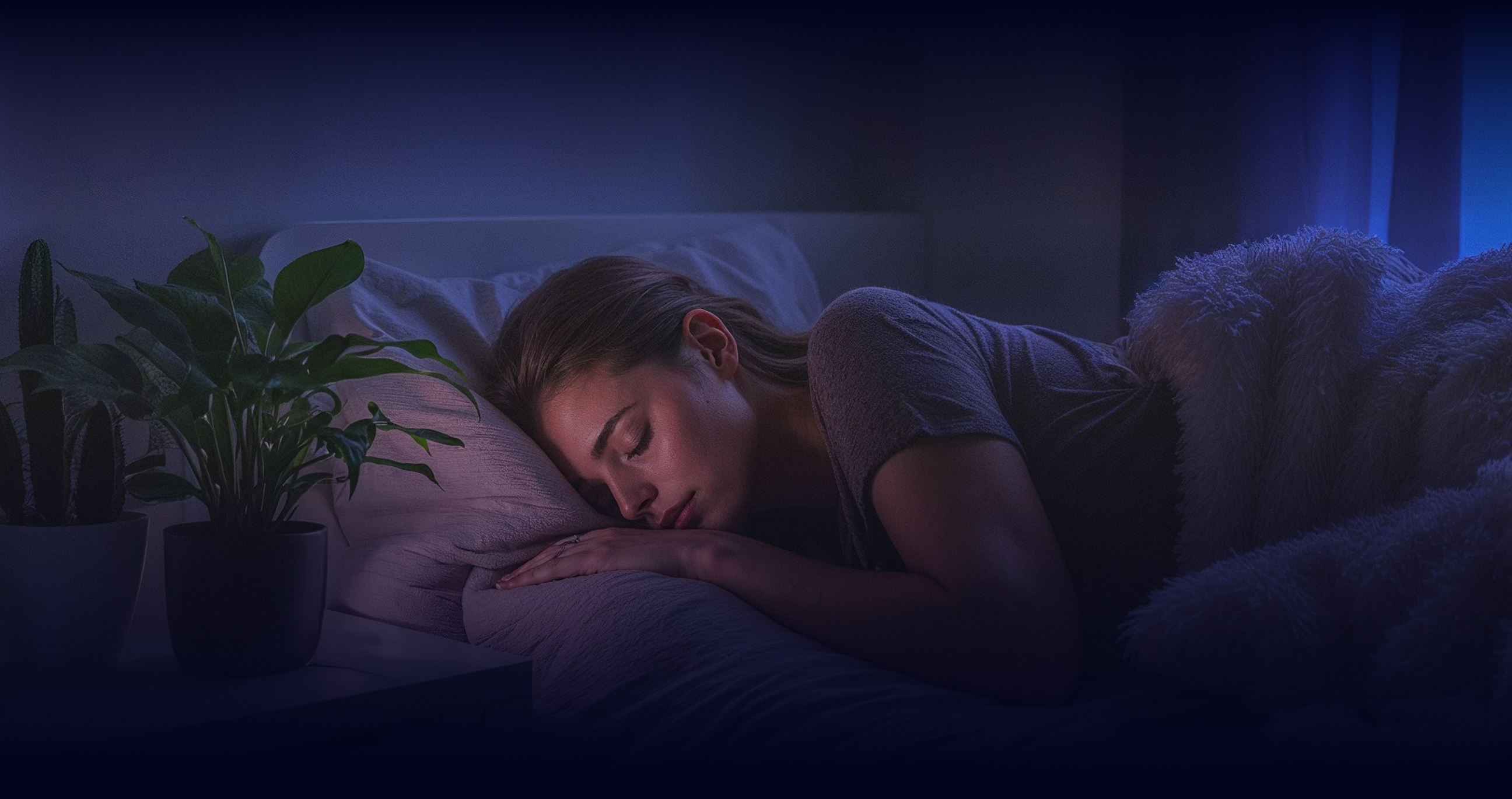 Woman sleeping soundly with sleep apnea mouthpiece