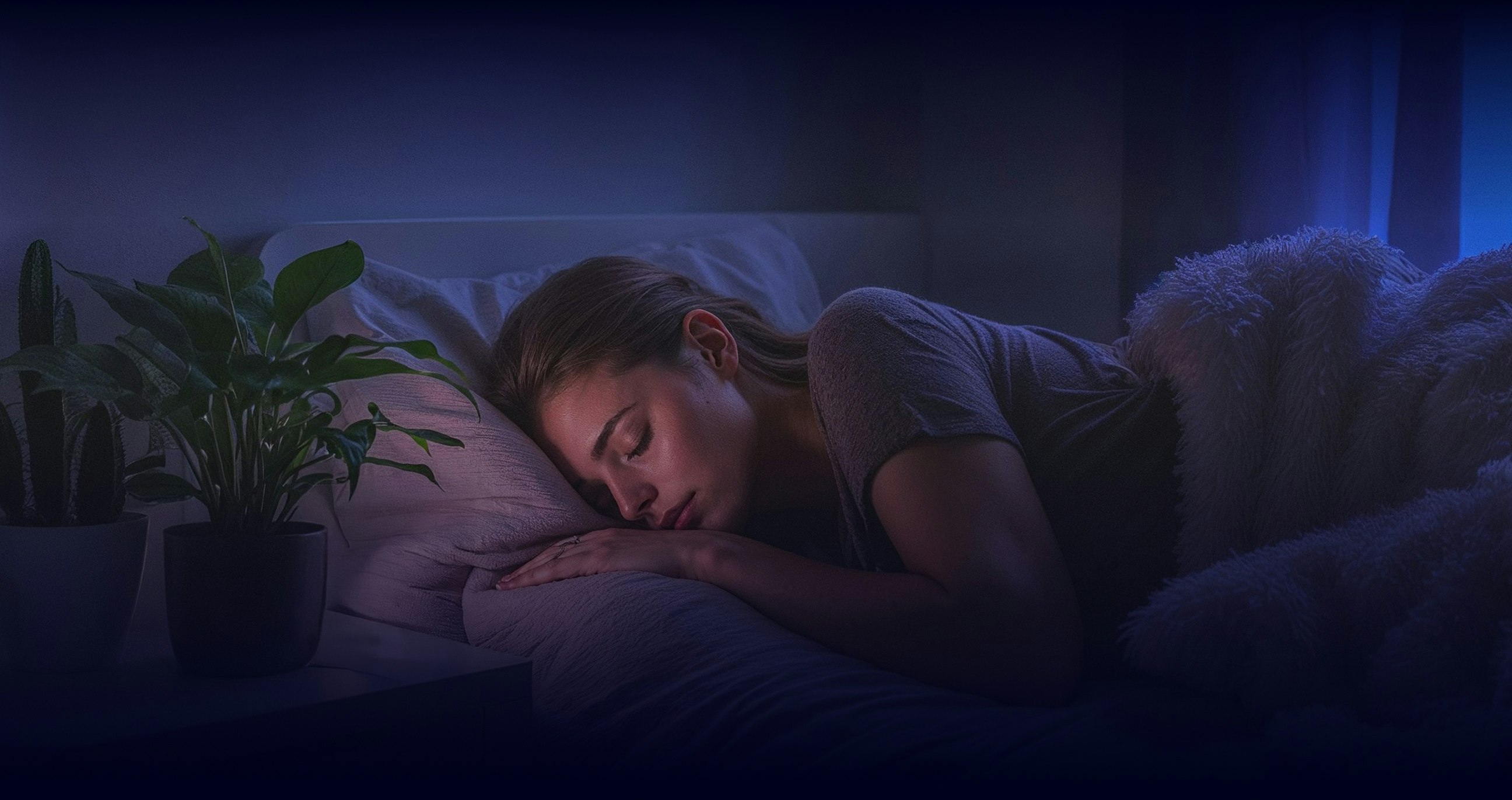 Woman sleeping soundly with sleep apnea mouthpiece