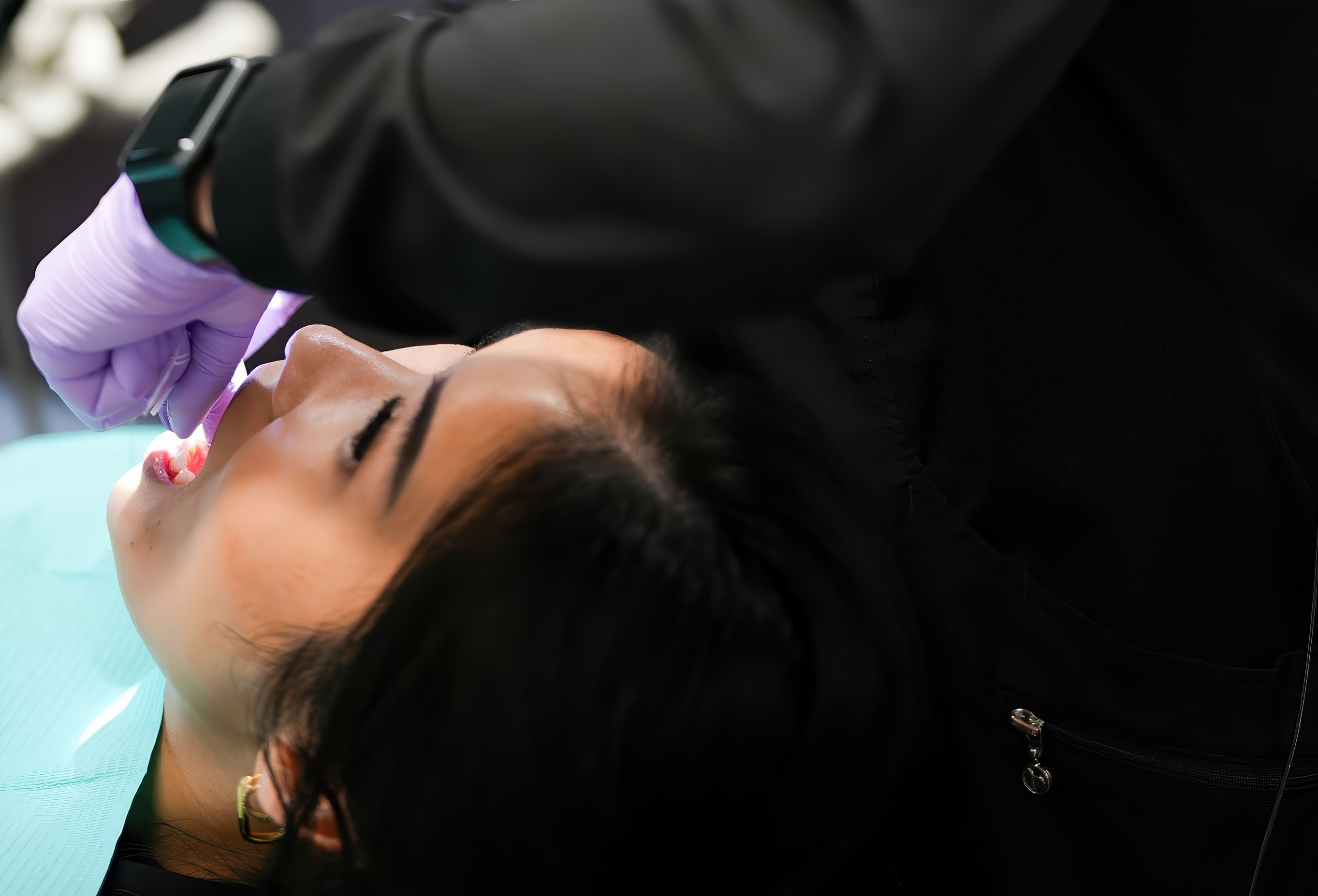 Montz and Maher Dental Group dentist speaking with a patient