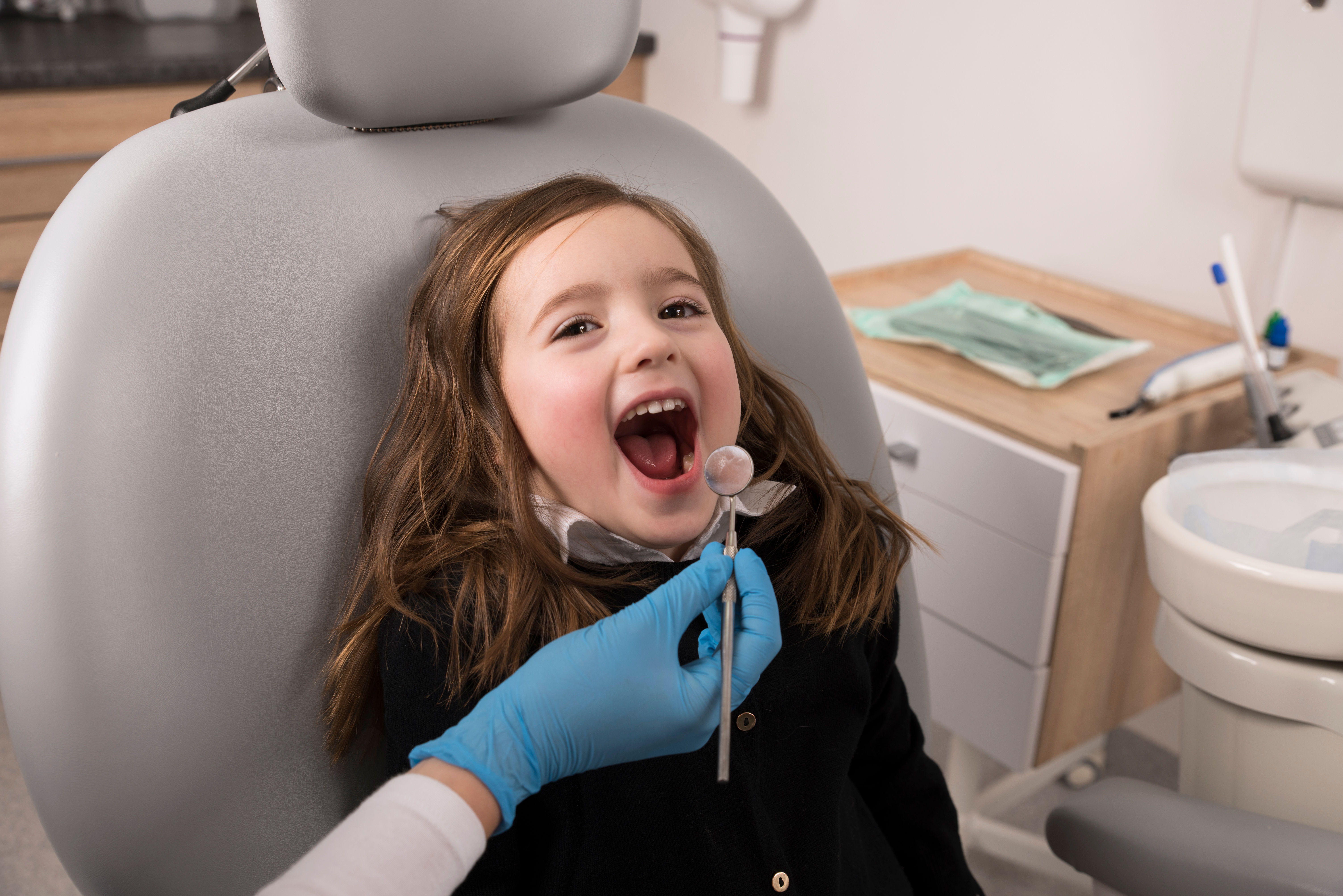 Young girl at the dentist