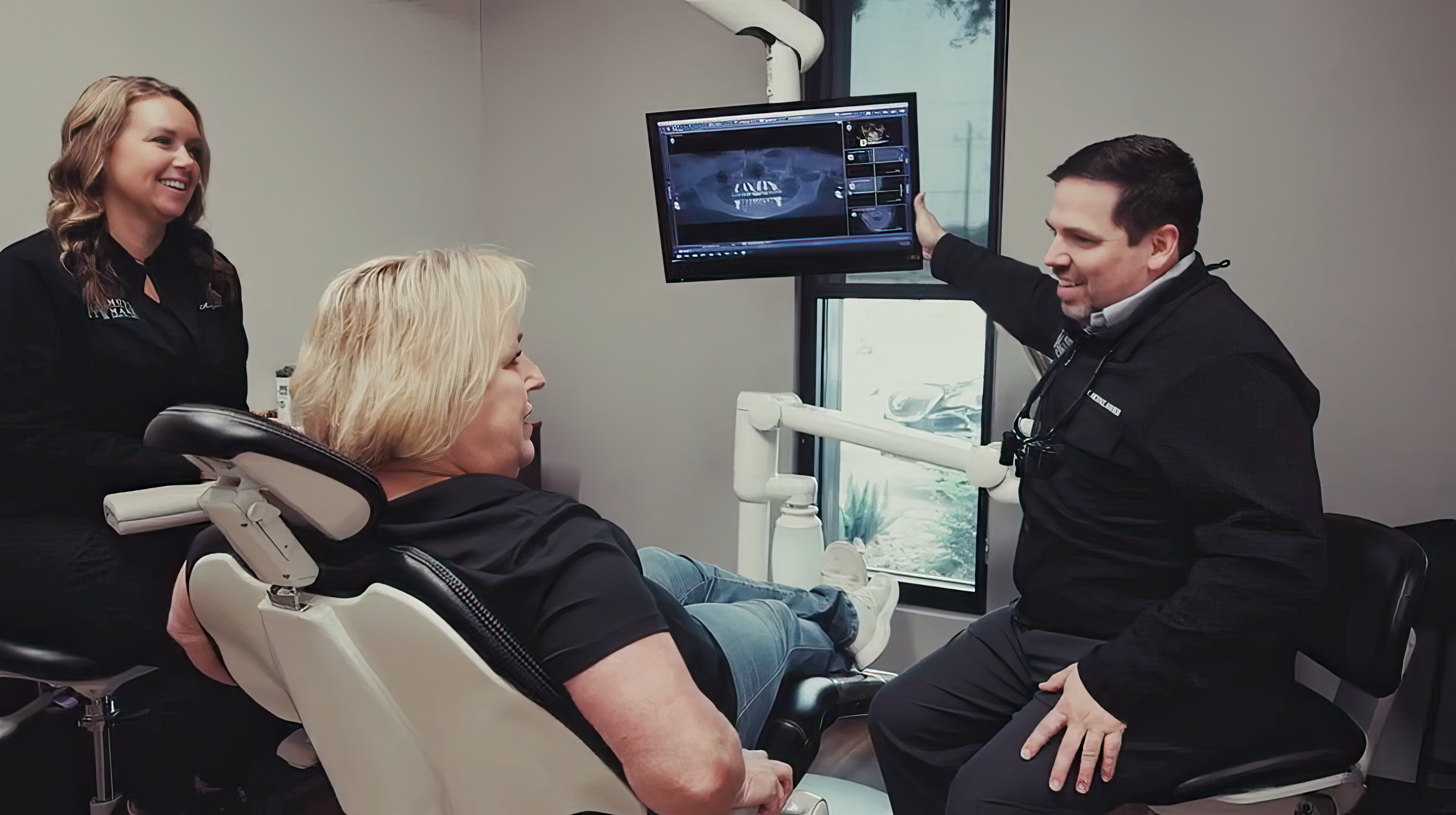 Dentist explaining imaging to patient
