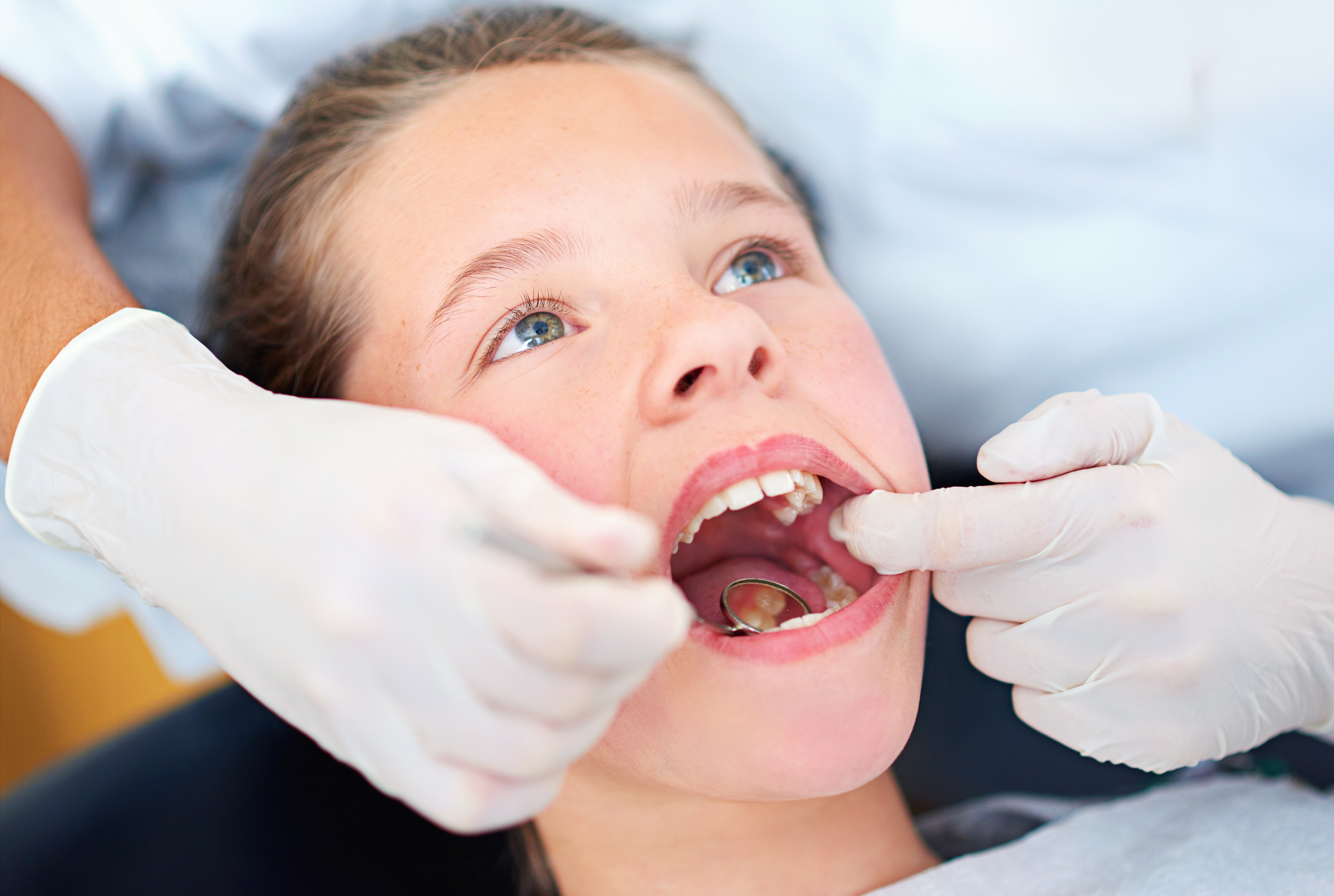 Child getting a dental cleaning