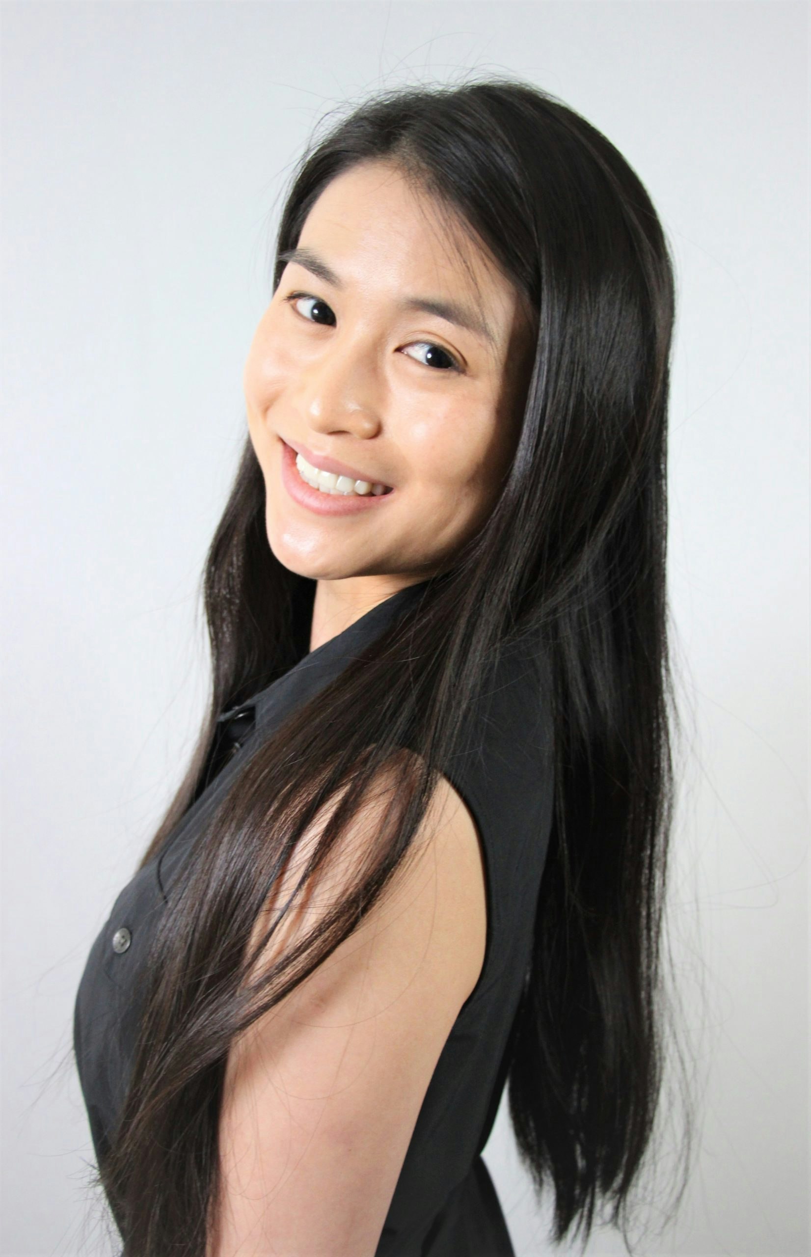 dark haired woman smiling