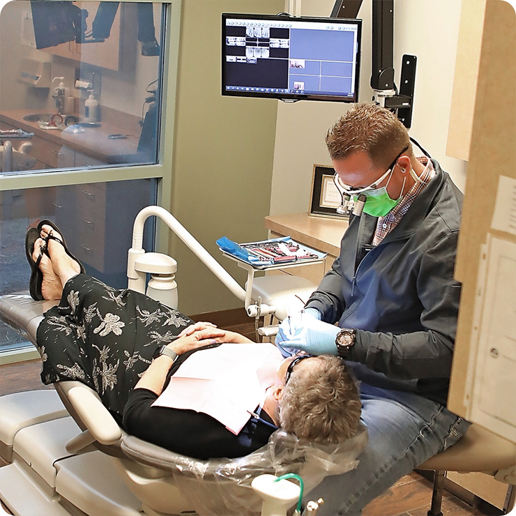 our dentist working on a patient