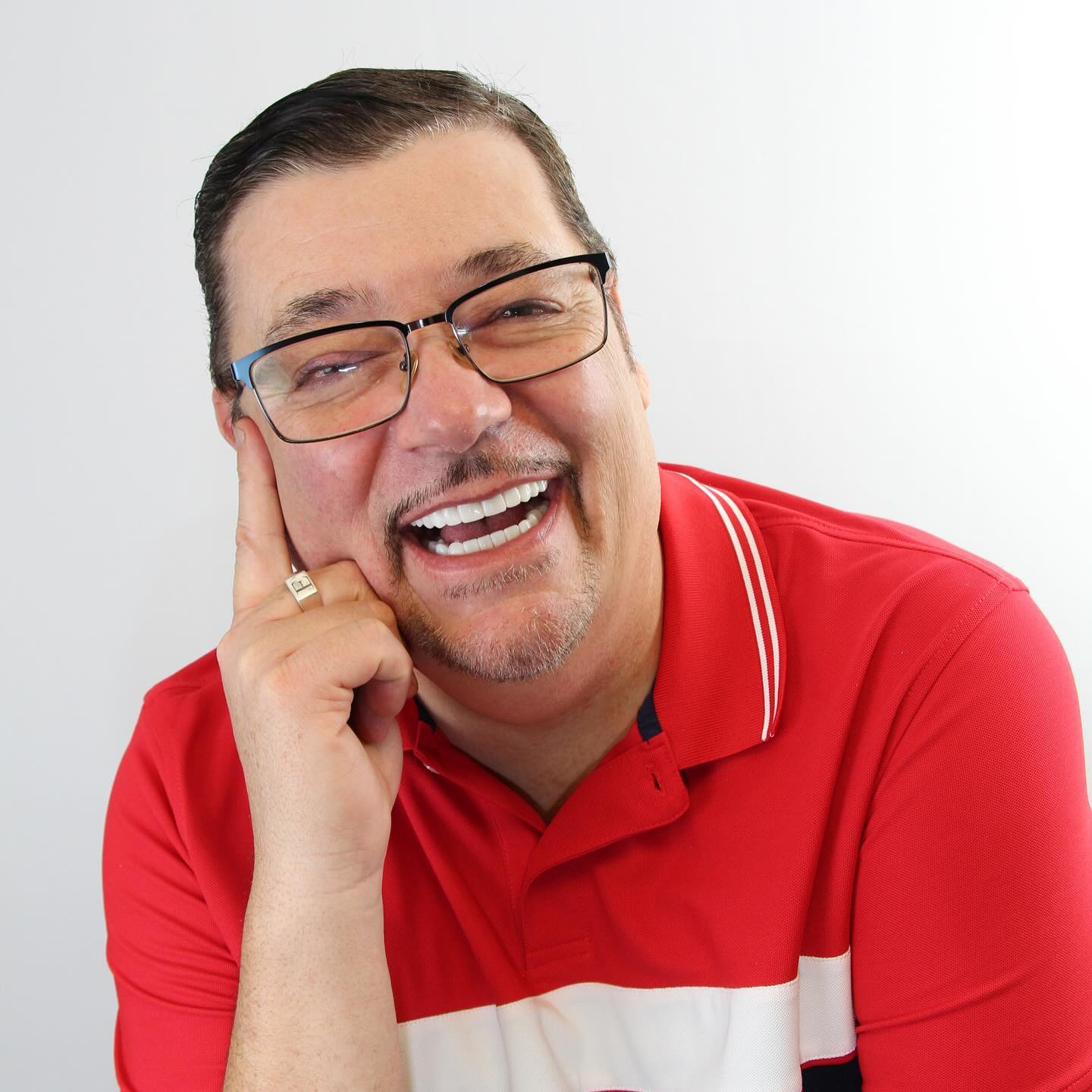 Young woman smiling in a blue shirt