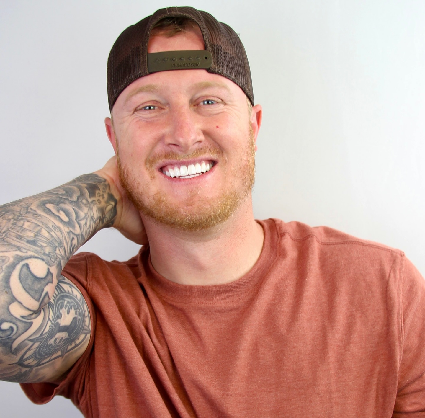 dark haired woman with gorgeous smile