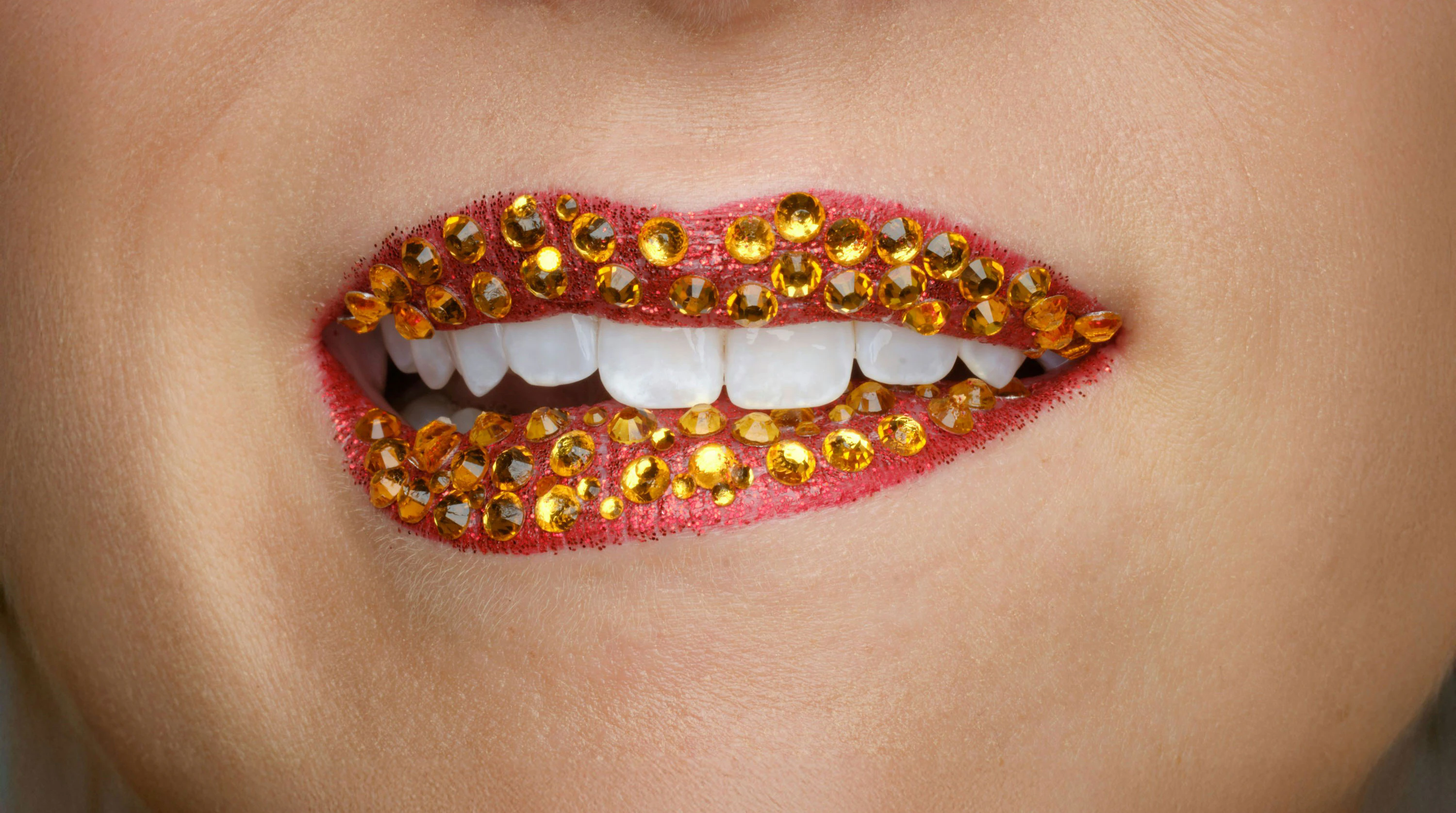 Bedazzled lips with white teeth