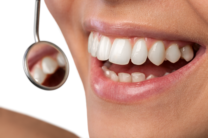 dental patient with dental mirror