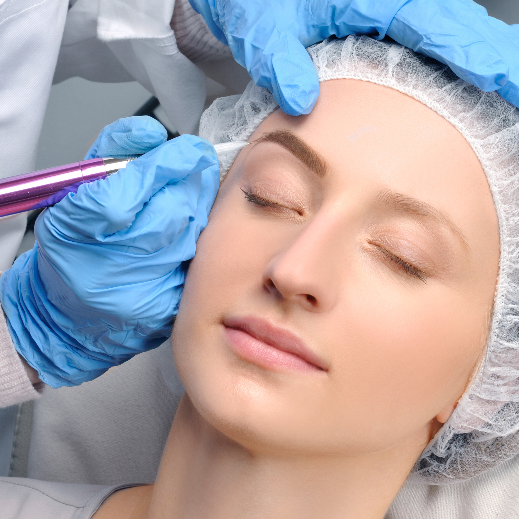 woman undergoing microblading