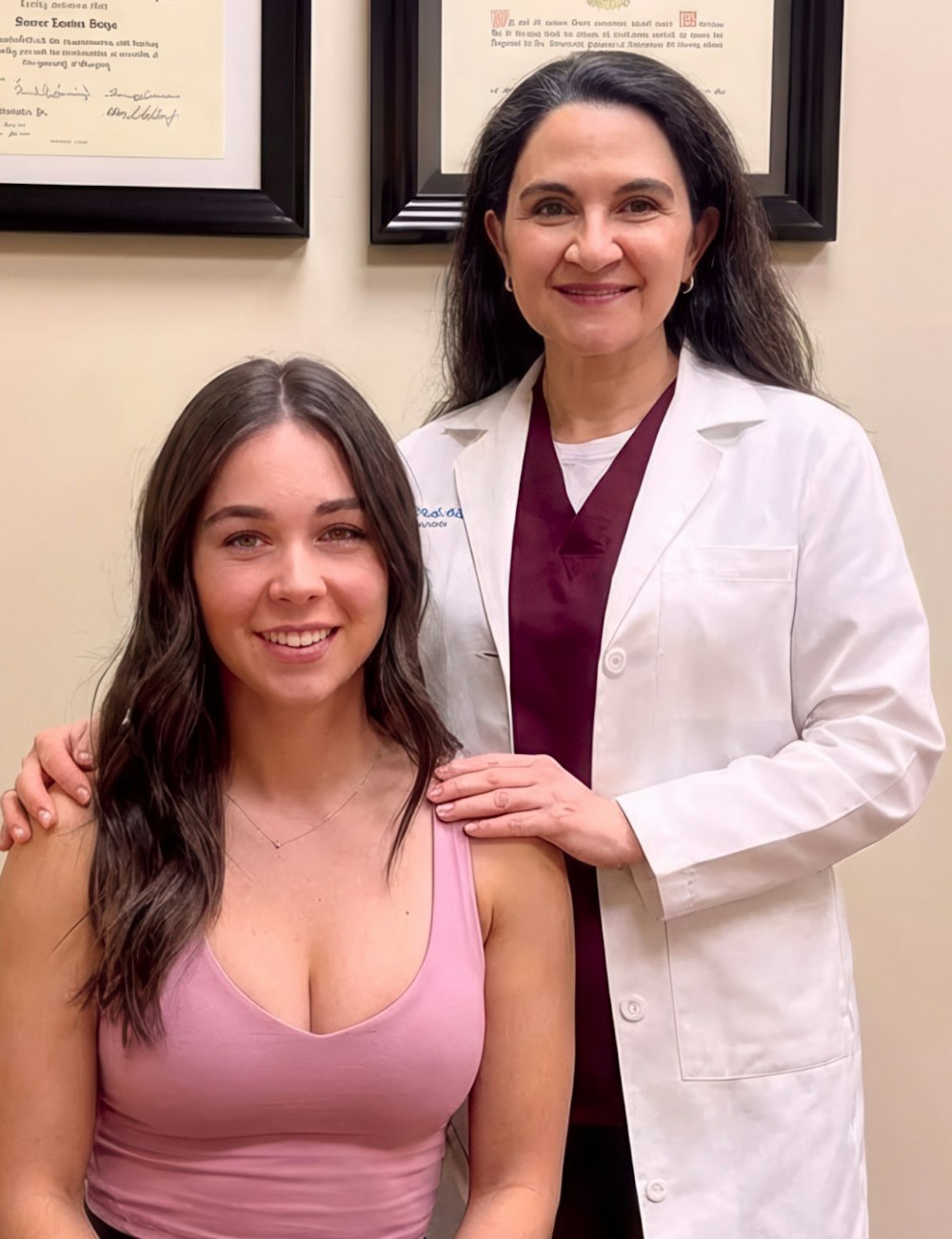 Dr. Daiza with patient in pink top