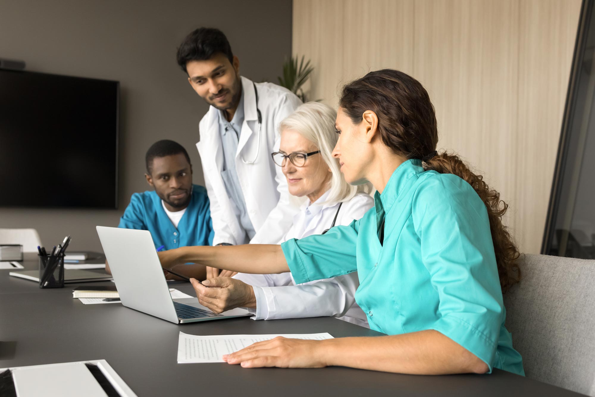 team collaborating on a patient case