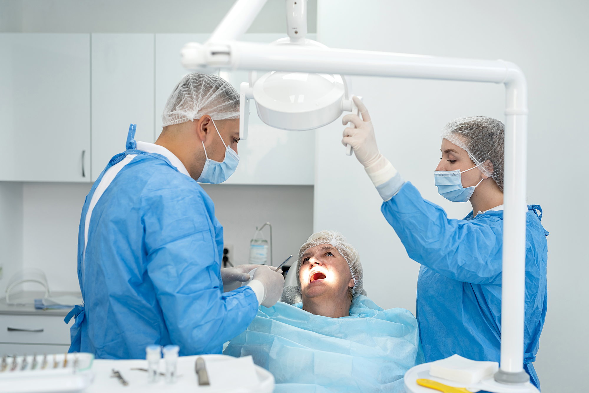 dentists working on a patient