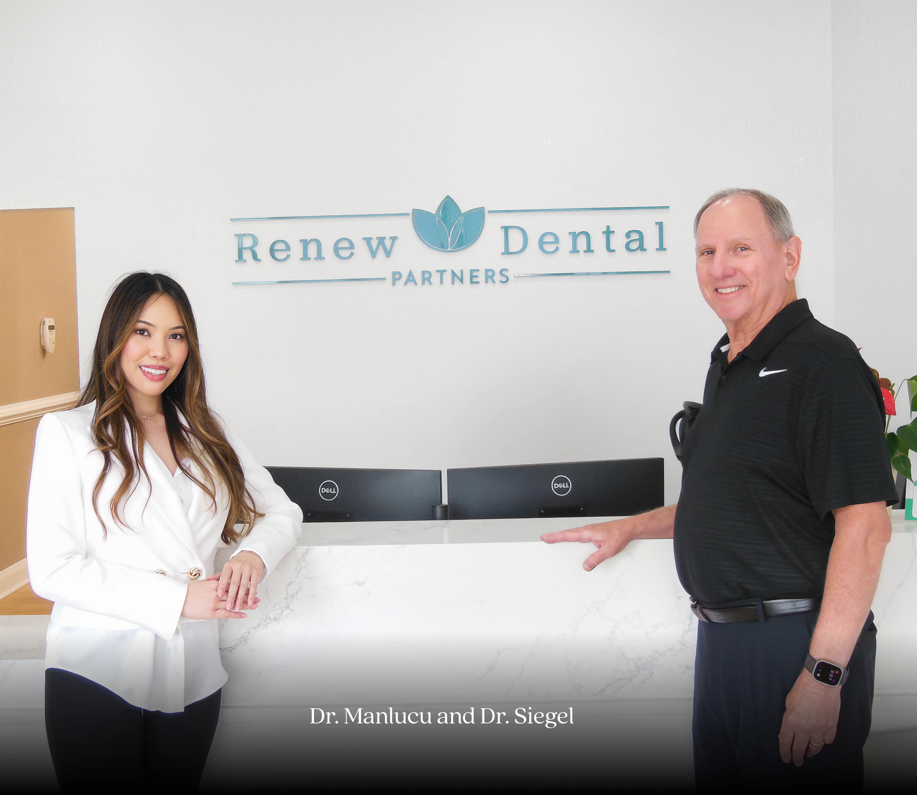 Dr. Manlucu and Dr. Siegel posing in Renew Dental Partners office