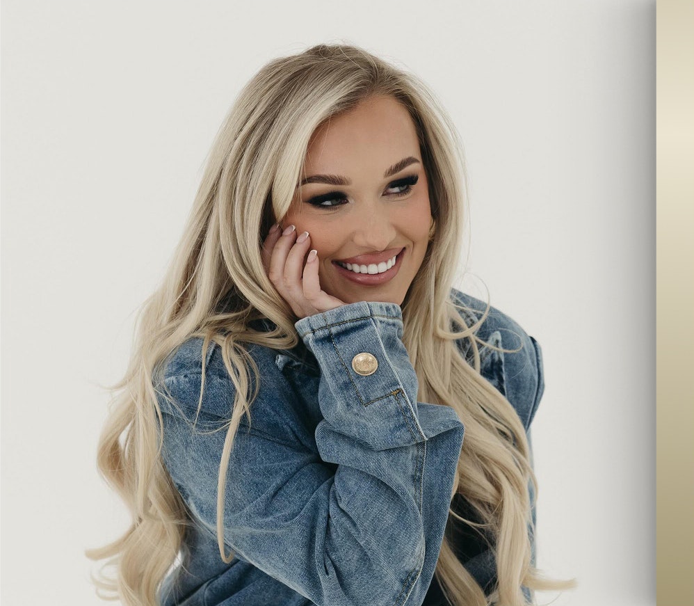 Smiling patient of Dr. Brooks after treatment