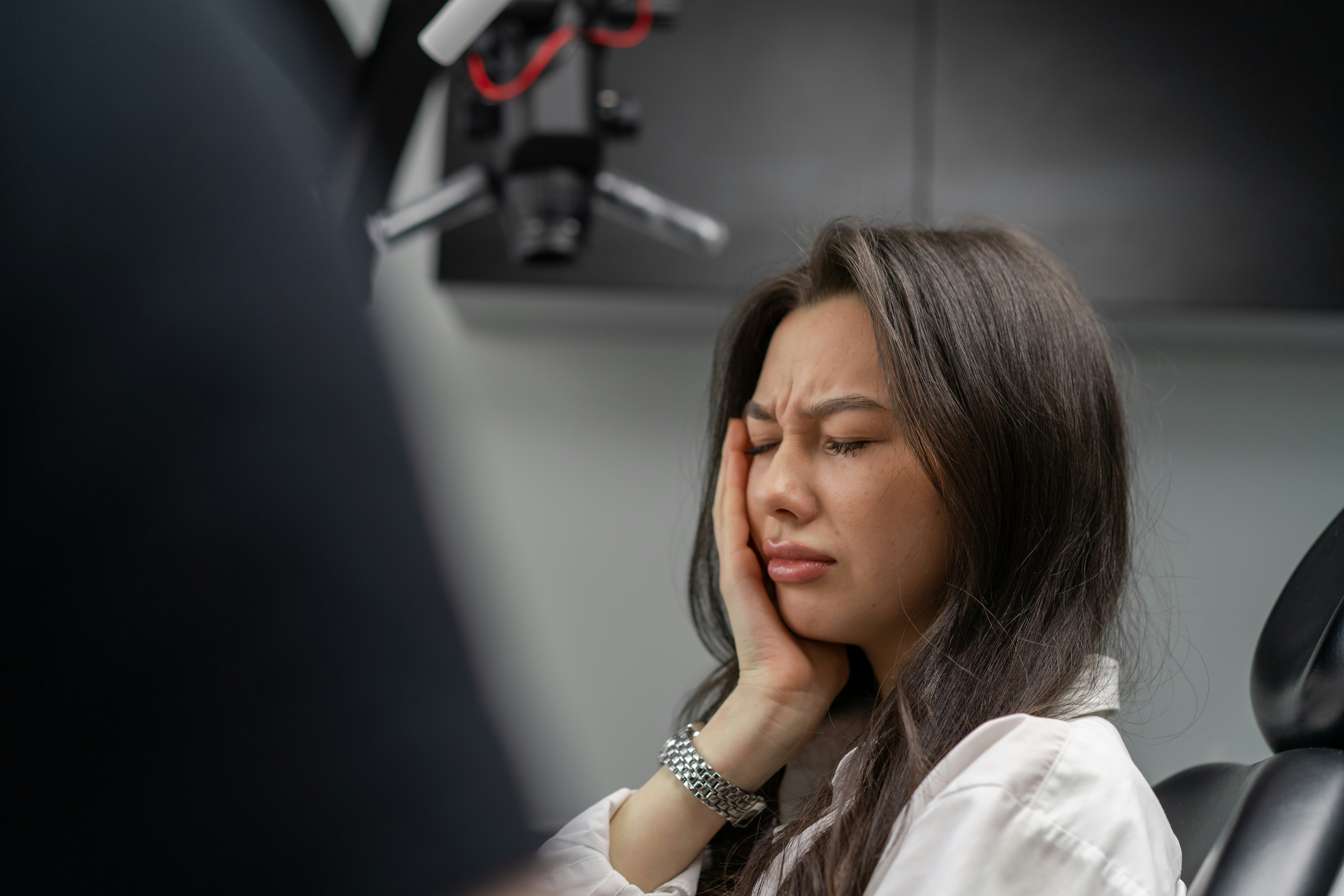 Woman in severe dental pain