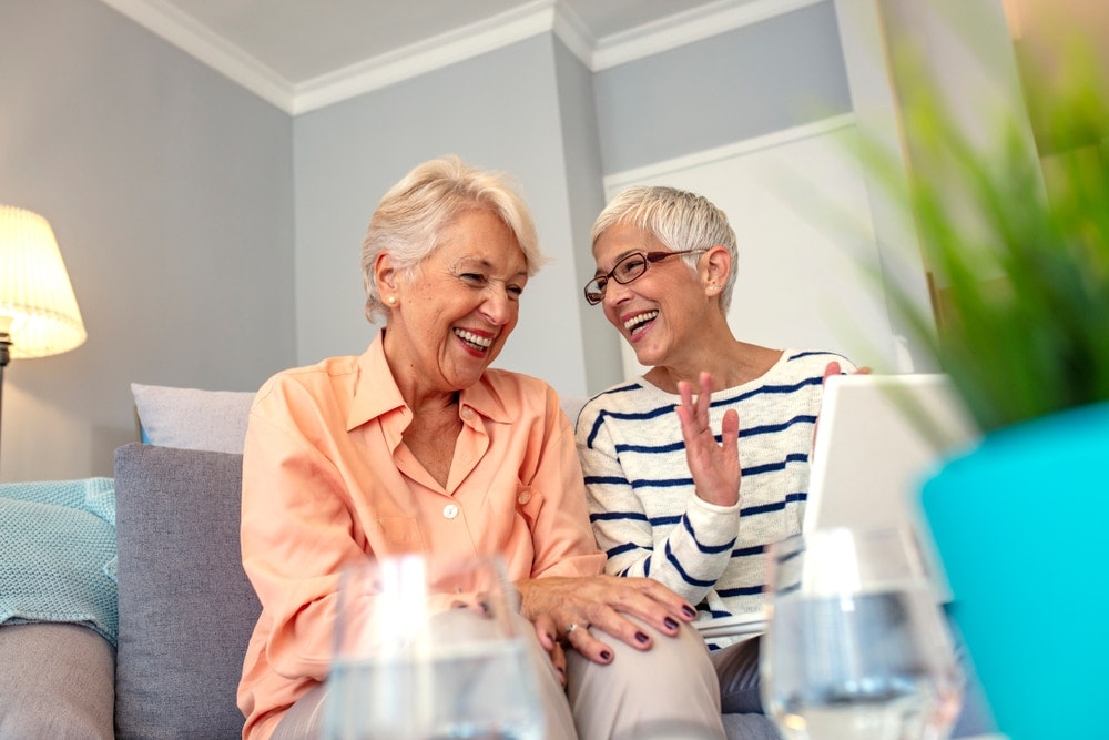 older women smiling and laughing