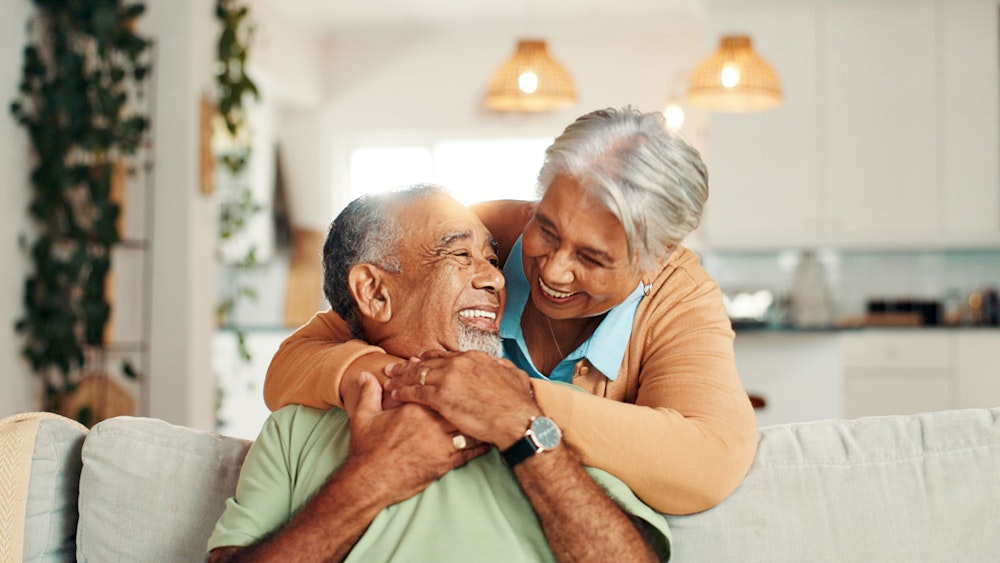 mature couple smiling and embracing