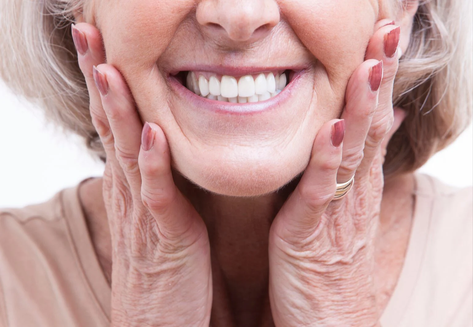 Older woman with natural looking dentures