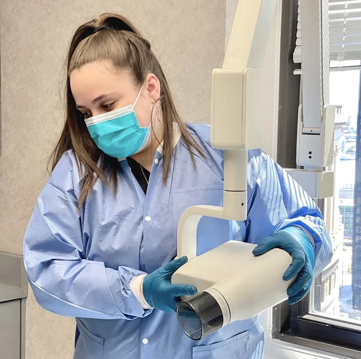 Dental staff using digital x-ray machine