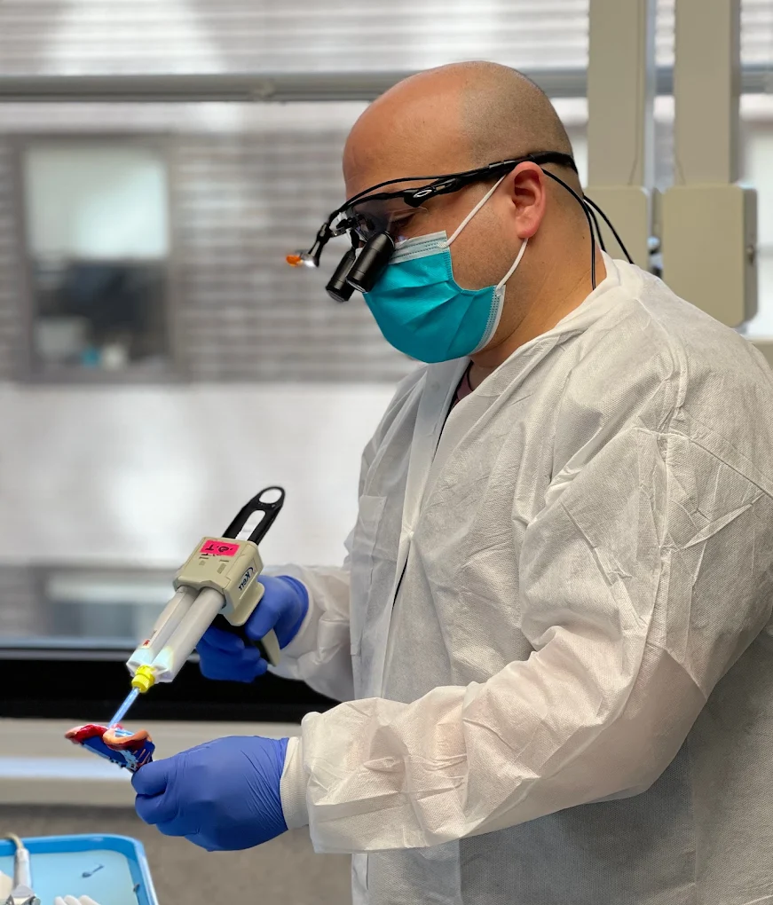 Dr. Goldstein working on a case