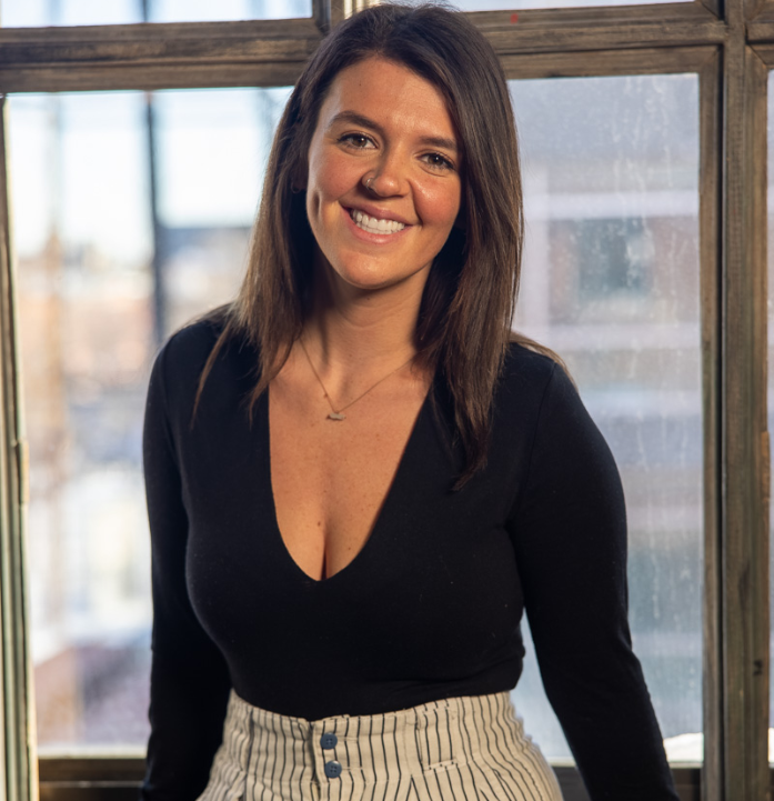young dark haired woman smiling