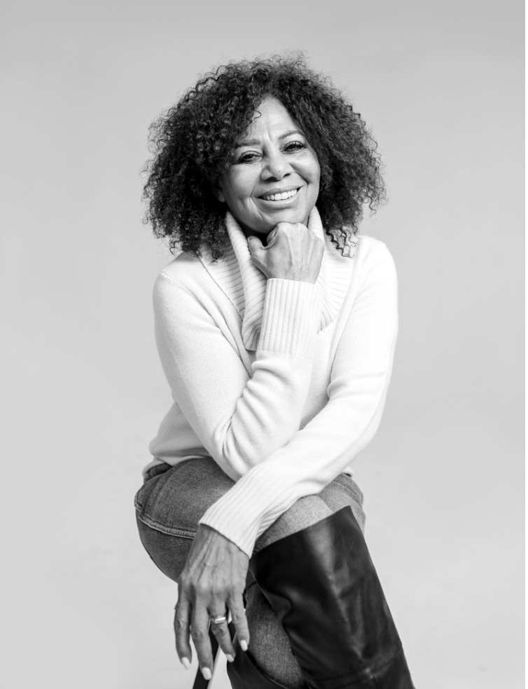 black and white photo of Smile Code patient with curly hair