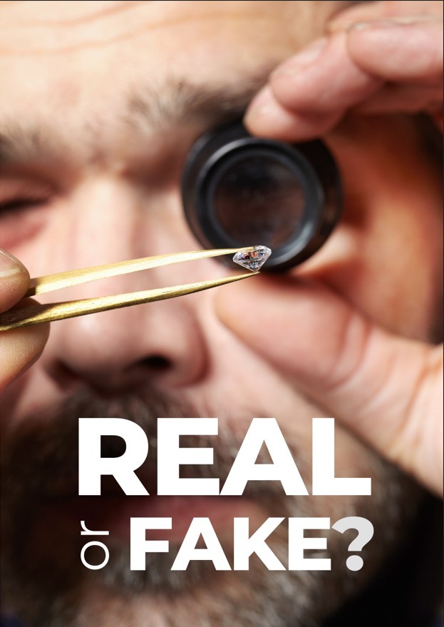 guy looking at a diamond