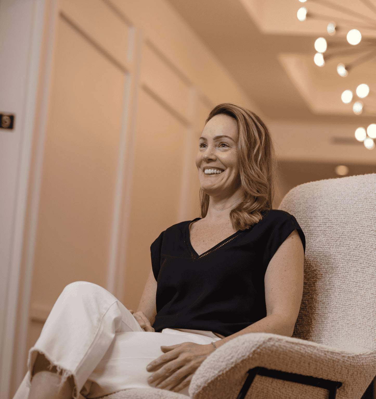 patient in waiting room smiling