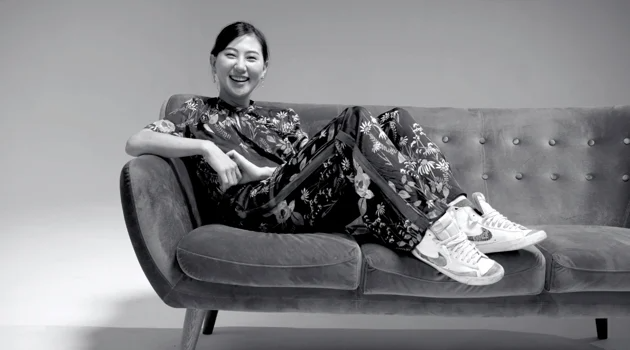 smiling patient lounging on couch