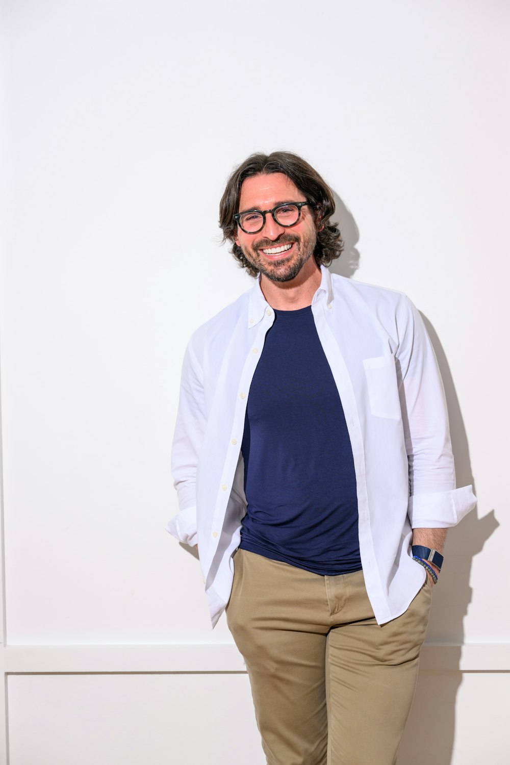 smiling man in glasses