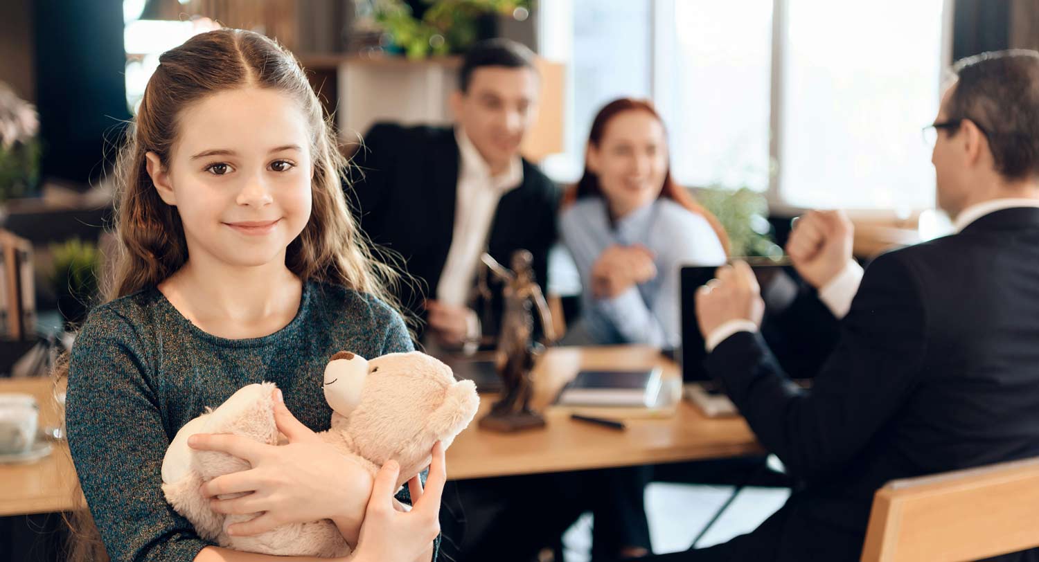Child with parents at law office