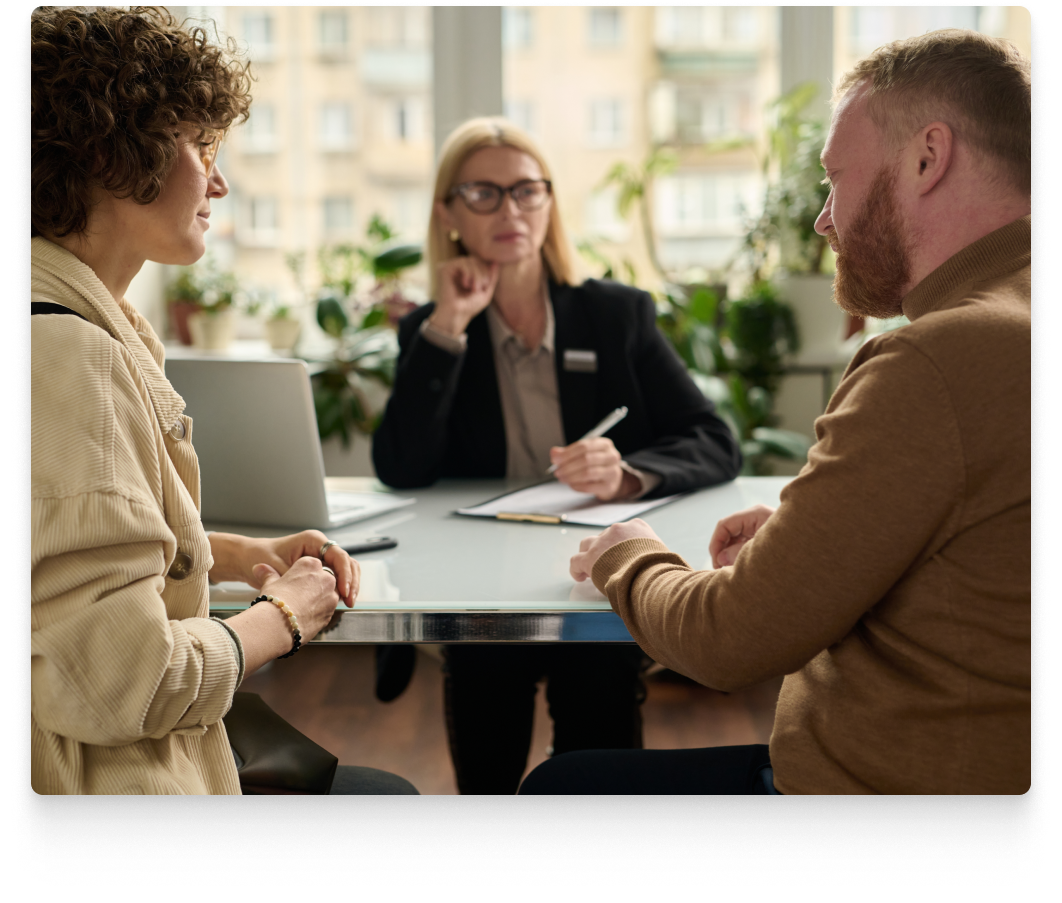 couple sitting with divorce attorney