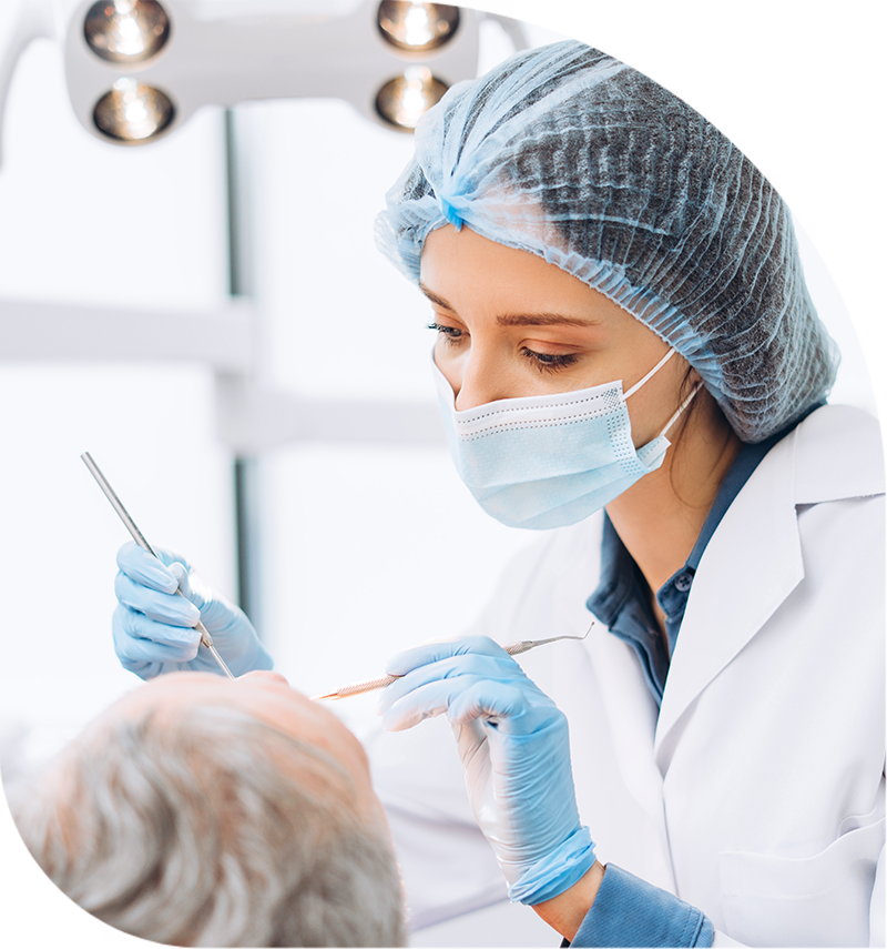 dentist performing root canal therapy