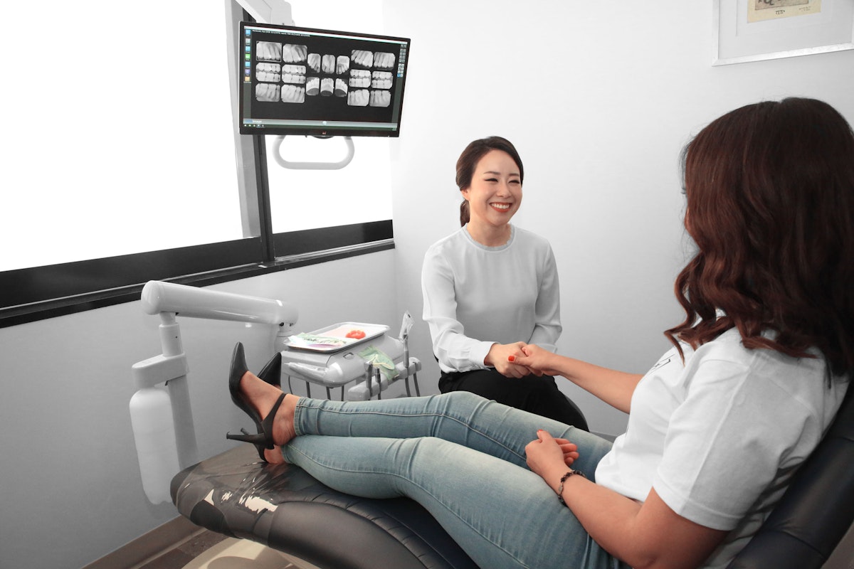 Dr. Oh with a patient