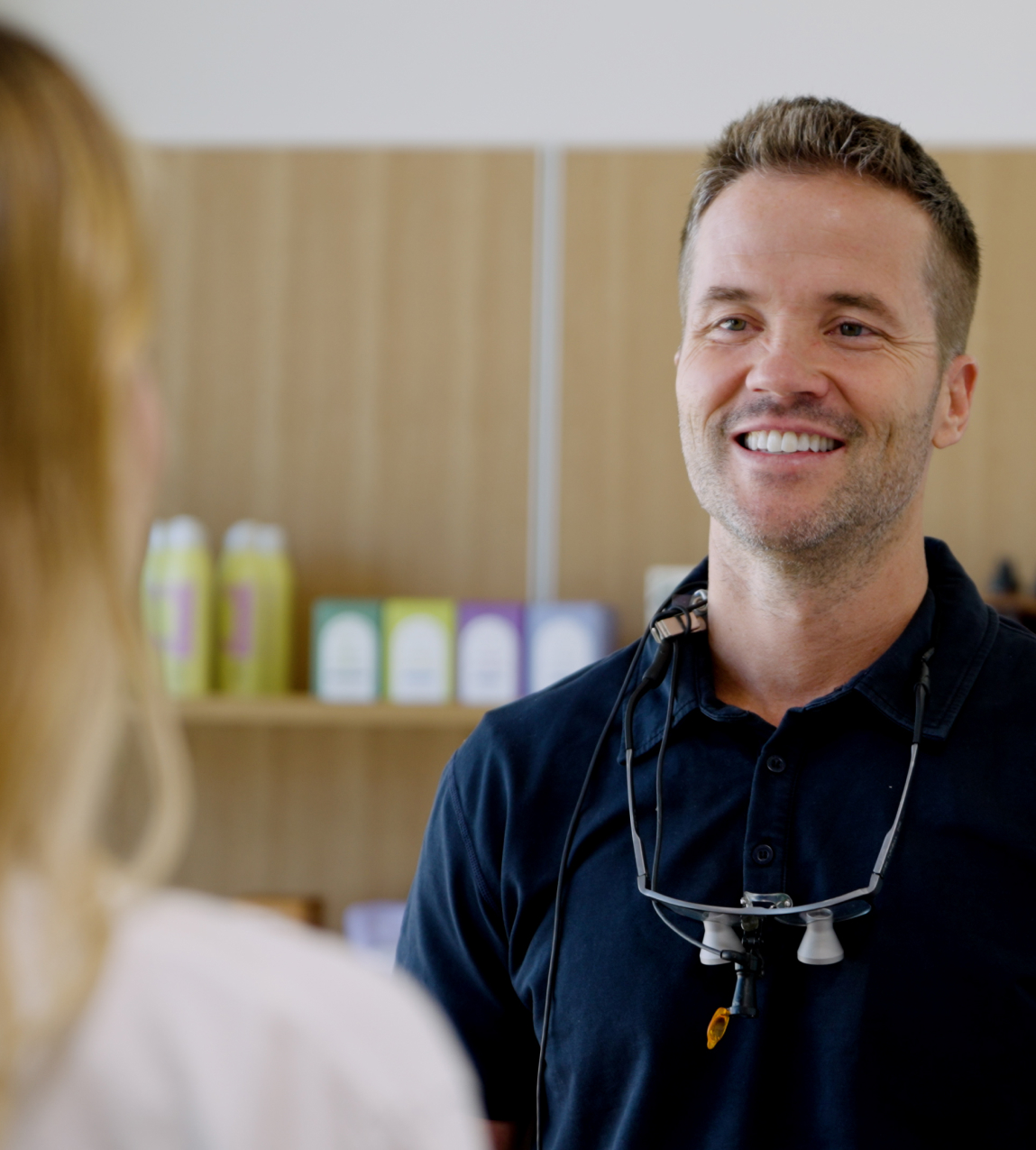 Dr. Turnbull smiling at patient
