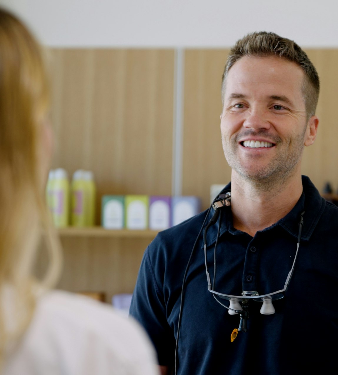 Dr. Turnbull smiling at patient